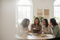 try generating an impage that would represent the impactelle mission and vision of professional and personal growth of women, has be be human and calm colors to match the branding colors of impactelle so when we will add pink text on it it would be leasible